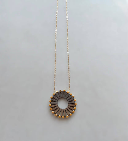 Pinwheel Hematite Necklace by Trecy Bleich